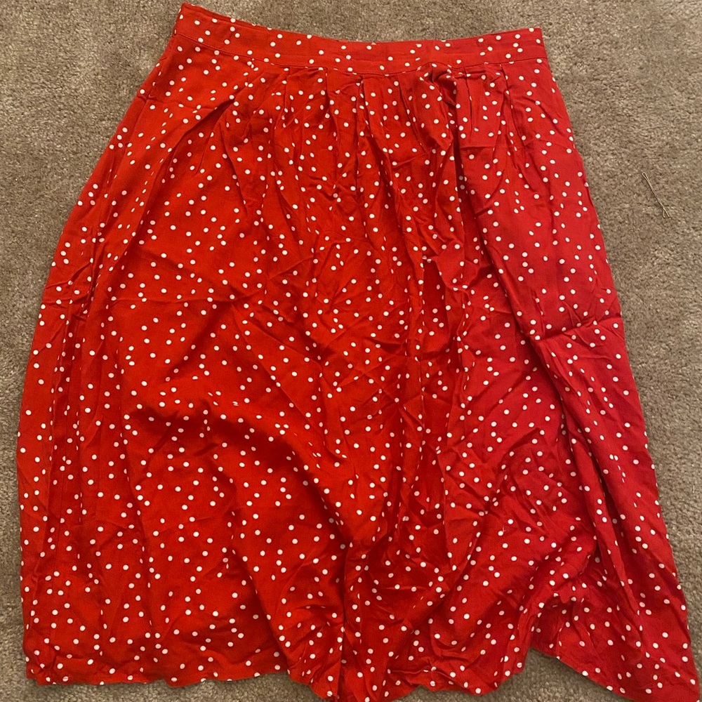 Red skirt with polka dot accent